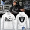 Street-style look featuring the unique Las Vegas Raiders Hoodie artwork
