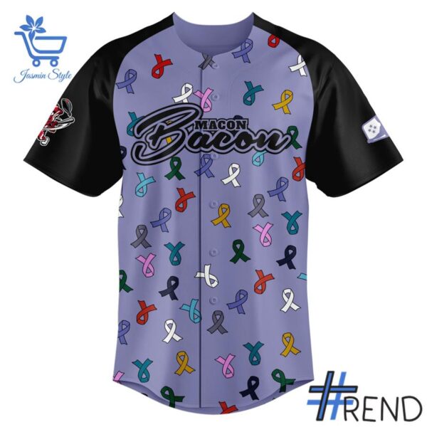 Detailed view of the 2 Macon Bacon Strike Out Cancer Jerseys print on fabric
