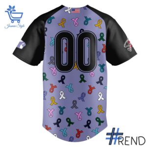 Detailed view of the 3 Macon Bacon Strike Out Cancer Jerseys print on fabric