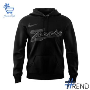 Street-style look featuring the unique Toros de Tijuana Hoodie artwork