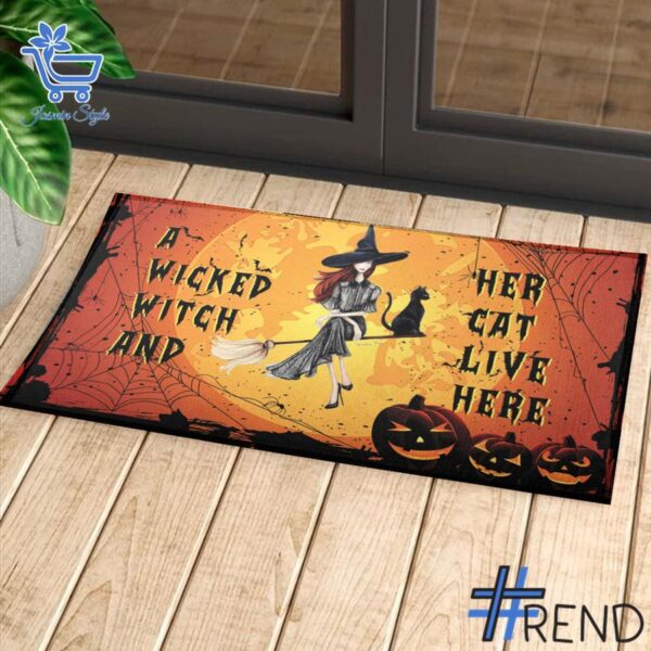 Take on every challenge with the A Wicked Witch And Her Cat Live Here Witch Doormat.