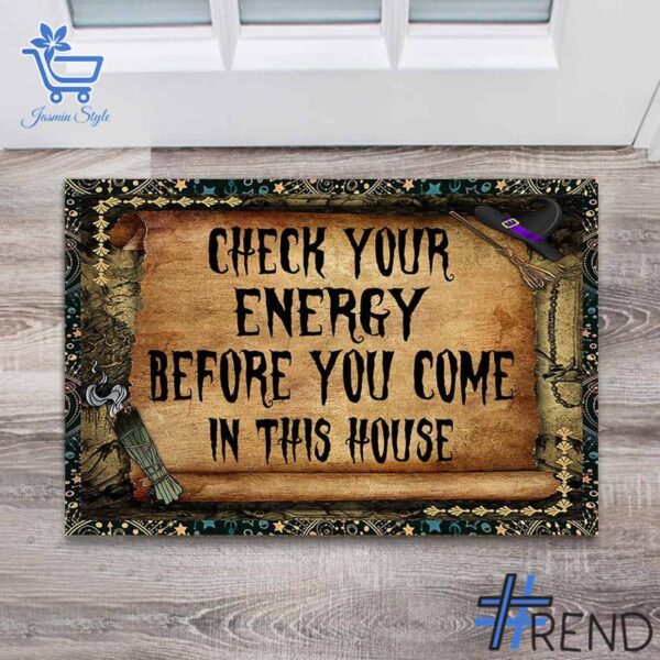 Take on every challenge with the Check Your Energy Before You Come In This House Witch Doormat.