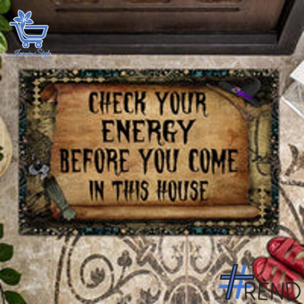 Take on every challenge with the Check Your Energy Before You Come In This House Witch Doormat.