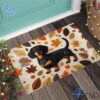 The Dachshund Fall Doormat adds a colorful spark to your wardrobe.