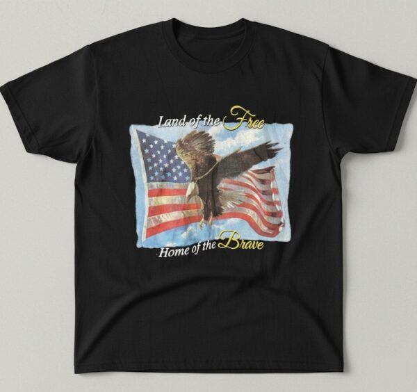 The Land Of The Free Home Of The Brave US Shirt adds a colorful spark to your wardrobe.
