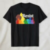 The Resist Rainbow Character Shirt brings street-ready confidence to everyday outfits.