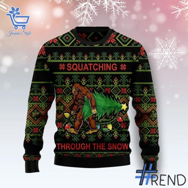 Express your true style with Bigfoot Squatching Through The Snow Christmas Sweater.