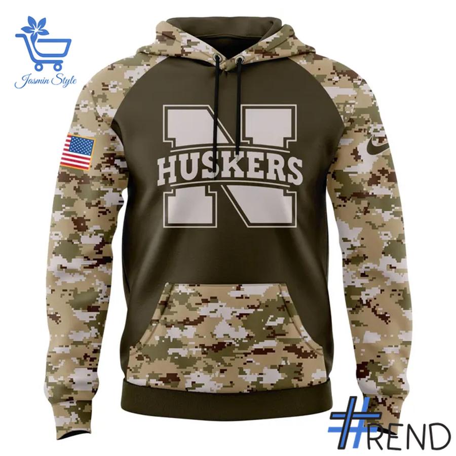 Sleek 2 Nebraska Cornhuskers football Camo 2025 Salute To Service Hoodie that complements both casual and streetwear styles.