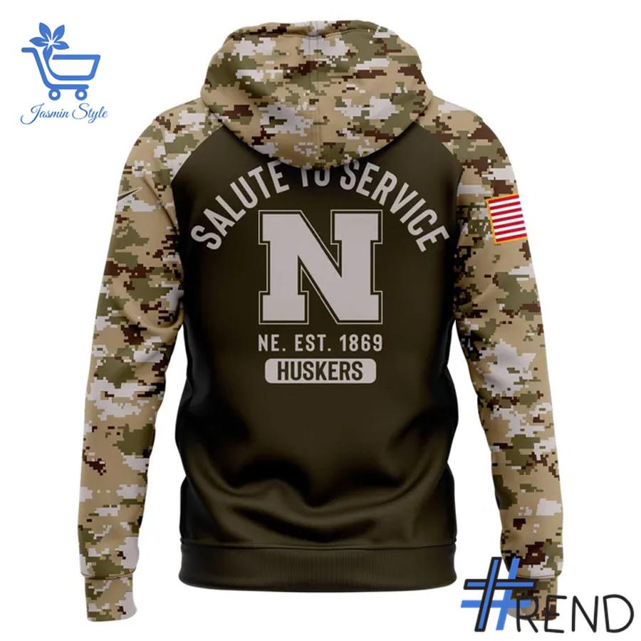 Sleek 3 Nebraska Cornhuskers football Camo 2025 Salute To Service Hoodie that complements both casual and streetwear styles.