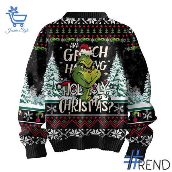 The Grinch Ho Ho Ho Christmas Sweater brings a fresh edge to your everyday outfit.